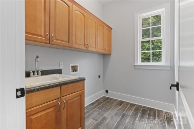 Welcome to 140 Pintail Run - beautifully renovated home nestled on Mallard Head Country Club in North Carolina - for sale on GolfHomes.com, golf home, golf lot