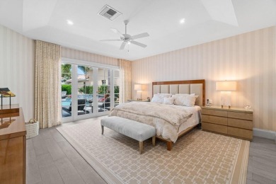 Experience luxury living in this beautifully renovated courtyard on Polo Club of Boca Raton in Florida - for sale on GolfHomes.com, golf home, golf lot