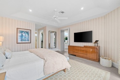 Experience luxury living in this beautifully renovated courtyard on Polo Club of Boca Raton in Florida - for sale on GolfHomes.com, golf home, golf lot