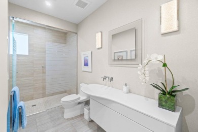 Experience luxury living in this beautifully renovated courtyard on Polo Club of Boca Raton in Florida - for sale on GolfHomes.com, golf home, golf lot