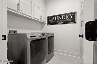 Gorgeous 4/3 Home with Pool in Camden of Lake Caroline. Welcome on Lake Caroline Golf Club in Mississippi - for sale on GolfHomes.com, golf home, golf lot