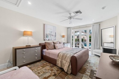 Experience luxury living in this beautifully renovated courtyard on Polo Club of Boca Raton in Florida - for sale on GolfHomes.com, golf home, golf lot