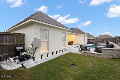 Gorgeous 4/3 Home with Pool in Camden of Lake Caroline. Welcome on Lake Caroline Golf Club in Mississippi - for sale on GolfHomes.com, golf home, golf lot