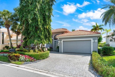 Experience luxury living in this beautifully renovated courtyard on Polo Club of Boca Raton in Florida - for sale on GolfHomes.com, golf home, golf lot
