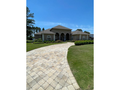 Welcome to this stunning golf course home in the lakefront on Red Eagle Golf Course in Alabama - for sale on GolfHomes.com, golf home, golf lot