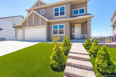 Welcome to this stunning two-story home that backs to Green on Green Valley Ranch Golf Club in Colorado - for sale on GolfHomes.com, golf home, golf lot