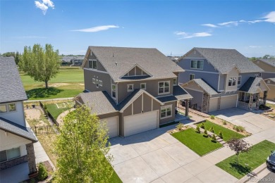 Welcome to this stunning two-story home that backs to Green on Green Valley Ranch Golf Club in Colorado - for sale on GolfHomes.com, golf home, golf lot