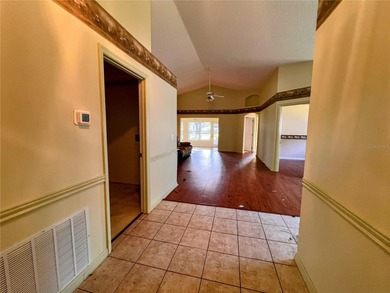 Under contract-accepting backup offers. Investor Special - Fixer on Kings Ridge Golf Club in Florida - for sale on GolfHomes.com, golf home, golf lot