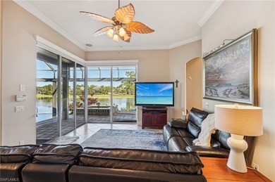 Step into a refined coastal retreat where panoramic lake views on Lely Resort Golf and Country Club in Florida - for sale on GolfHomes.com, golf home, golf lot