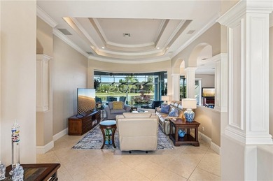 Step into a refined coastal retreat where panoramic lake views on Lely Resort Golf and Country Club in Florida - for sale on GolfHomes.com, golf home, golf lot