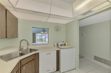 Attractive two bedroom, two bath, second floor condo, in the on Capri Isle Golf Club in Florida - for sale on GolfHomes.com, golf home, golf lot