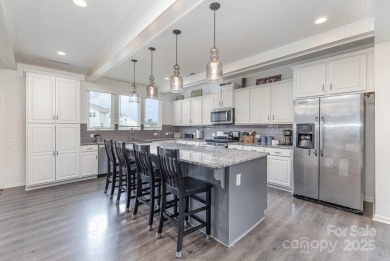 Nestled within the esteemed Stonebridge community, this home on Stonebridge Golf Club in North Carolina - for sale on GolfHomes.com, golf home, golf lot