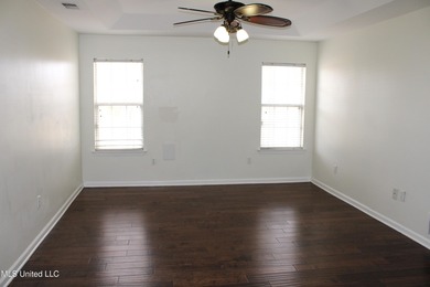 Nestled in the prestigious Plantation Subdivision, this stunning on The Plantation Golf Club in Mississippi - for sale on GolfHomes.com, golf home, golf lot