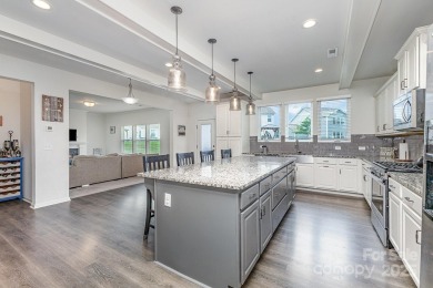 Nestled within the esteemed Stonebridge community, this home on Stonebridge Golf Club in North Carolina - for sale on GolfHomes.com, golf home, golf lot