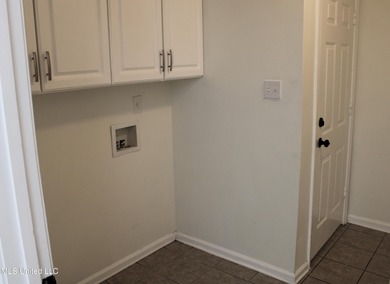 Nestled in the prestigious Plantation Subdivision, this stunning on The Plantation Golf Club in Mississippi - for sale on GolfHomes.com, golf home, golf lot