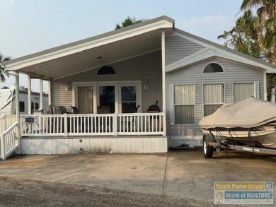 This extremely spacious park model with island room has lots of on Long Island Golf Course in Texas - for sale on GolfHomes.com, golf home, golf lot