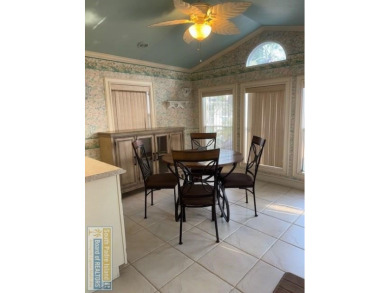 This extremely spacious park model with island room has lots of on Long Island Golf Course in Texas - for sale on GolfHomes.com, golf home, golf lot