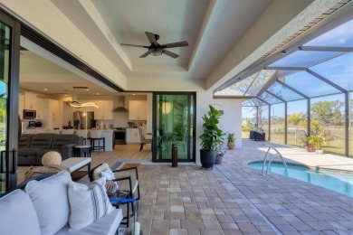 This exquisite, nearly brand-new DM Dean home is nestled on a on Rotonda Golf and Country Club The Links Course in Florida - for sale on GolfHomes.com, golf home, golf lot