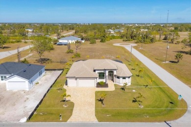 This exquisite, nearly brand-new DM Dean home is nestled on a on Rotonda Golf and Country Club The Links Course in Florida - for sale on GolfHomes.com, golf home, golf lot