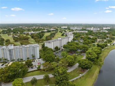 Motivated Seller - Beautifully updated 3/2 corner unit with on Palm-Aire Country Club and Resort - Palms in Florida - for sale on GolfHomes.com, golf home, golf lot