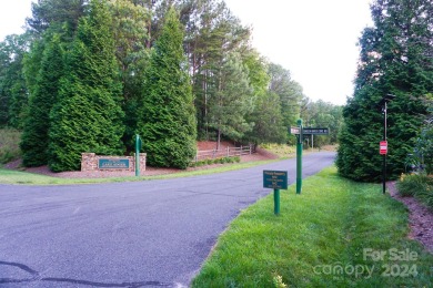 3.87+/- acres in River Park at Lake Adger development. Lot has on Brights Creek Golf Course in North Carolina - for sale on GolfHomes.com, golf home, golf lot