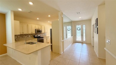 One or more photo(s) has been virtually staged. PRIVATE TREED on Candler Hills Golf and Country Club in Florida - for sale on GolfHomes.com, golf home, golf lot