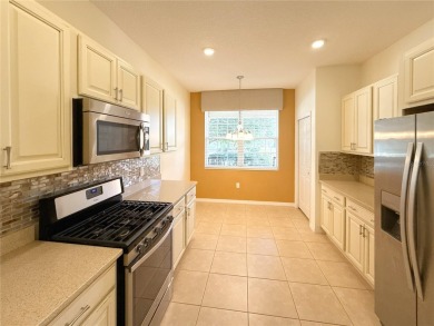 One or more photo(s) has been virtually staged. PRIVATE TREED on Candler Hills Golf and Country Club in Florida - for sale on GolfHomes.com, golf home, golf lot