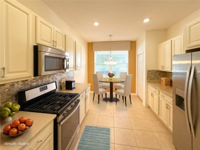 One or more photo(s) has been virtually staged. PRIVATE TREED on Candler Hills Golf and Country Club in Florida - for sale on GolfHomes.com, golf home, golf lot
