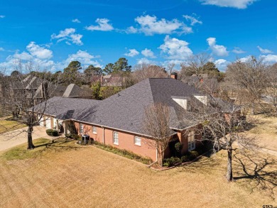 Come take a tour of this breathtaking 5-bedroom, 5-bathroom on Hollytree Country Club in Texas - for sale on GolfHomes.com, golf home, golf lot