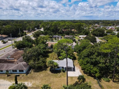 This beautifully remodeled 3/2 ranch style home with a one car on Daytona Beach Golf Club in Florida - for sale on GolfHomes.com, golf home, golf lot