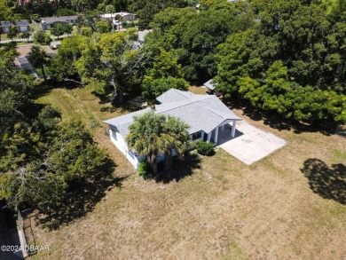 This beautifully remodeled 3/2 ranch style home with a one car on Daytona Beach Golf Club in Florida - for sale on GolfHomes.com, golf home, golf lot