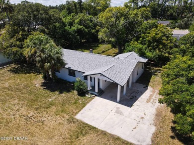 This beautifully remodeled 3/2 ranch style home with a one car on Daytona Beach Golf Club in Florida - for sale on GolfHomes.com, golf home, golf lot