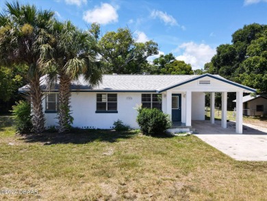 This beautifully remodeled 3/2 ranch style home with a one car on Daytona Beach Golf Club in Florida - for sale on GolfHomes.com, golf home, golf lot