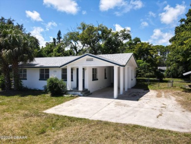 This beautifully remodeled 3/2 ranch style home with a one car on Daytona Beach Golf Club in Florida - for sale on GolfHomes.com, golf home, golf lot