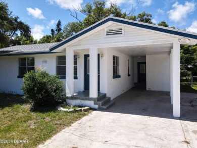 This beautifully remodeled 3/2 ranch style home with a one car on Daytona Beach Golf Club in Florida - for sale on GolfHomes.com, golf home, golf lot