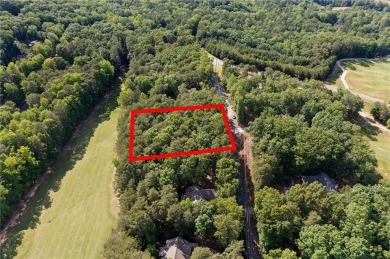 This gently sloped lot backs directly up to the lush fairways of on The Highlands Course at Lake Arrowhead in Georgia - for sale on GolfHomes.com, golf home, golf lot