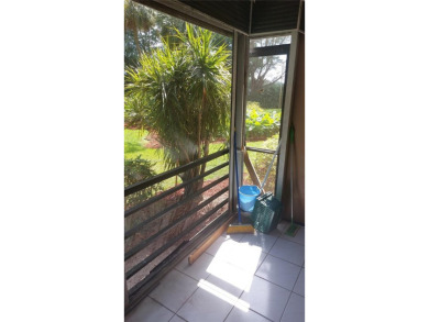 Don't miss this beautifully maintained ground floor corner unit on Pembroke Lakes Golf Club in Florida - for sale on GolfHomes.com, golf home, golf lot