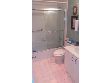 Don't miss this beautifully maintained ground floor corner unit on Pembroke Lakes Golf Club in Florida - for sale on GolfHomes.com, golf home, golf lot