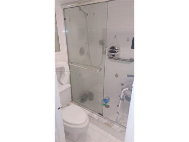 Don't miss this beautifully maintained ground floor corner unit on Pembroke Lakes Golf Club in Florida - for sale on GolfHomes.com, golf home, golf lot