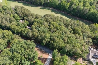 This gently sloped lot backs directly up to the lush fairways of on The Highlands Course at Lake Arrowhead in Georgia - for sale on GolfHomes.com, golf home, golf lot