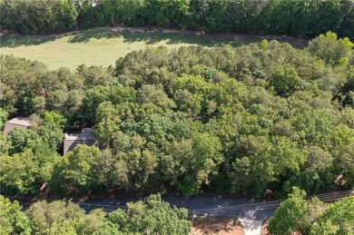 This gently sloped lot backs directly up to the lush fairways of on The Highlands Course at Lake Arrowhead in Georgia - for sale on GolfHomes.com, golf home, golf lot
