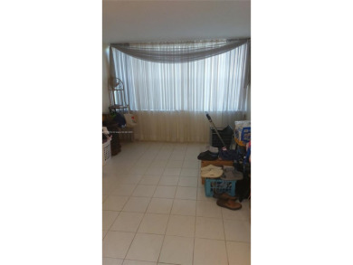 Don't miss this beautifully maintained ground floor corner unit on Pembroke Lakes Golf Club in Florida - for sale on GolfHomes.com, golf home, golf lot