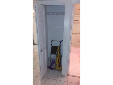 Don't miss this beautifully maintained ground floor corner unit on Pembroke Lakes Golf Club in Florida - for sale on GolfHomes.com, golf home, golf lot