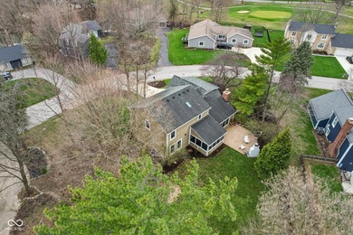 Welcome home to this remarkable four-bedroom, two-story on Harbour Trees Golf Club in Indiana - for sale on GolfHomes.com, golf home, golf lot