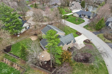 Welcome home to this remarkable four-bedroom, two-story on Harbour Trees Golf Club in Indiana - for sale on GolfHomes.com, golf home, golf lot