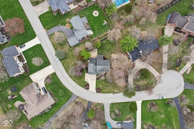 Welcome home to this remarkable four-bedroom, two-story on Harbour Trees Golf Club in Indiana - for sale on GolfHomes.com, golf home, golf lot