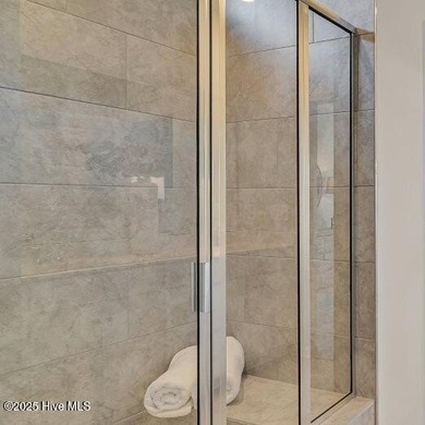 Live exceptionally in Brunswick Plantation's premier golf on Brunswick Plantation and Golf Resorts in North Carolina - for sale on GolfHomes.com, golf home, golf lot