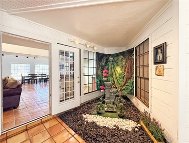 This classic-style 2-story residence is a statement of elegance on Rockport Country Club in Texas - for sale on GolfHomes.com, golf home, golf lot