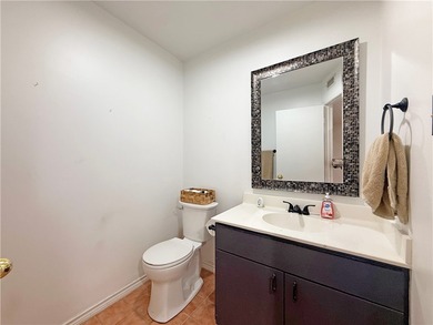 This classic-style 2-story residence is a statement of elegance on Rockport Country Club in Texas - for sale on GolfHomes.com, golf home, golf lot