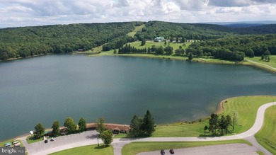 Experience ALPINE LAKE RESORT LIVING at its finest on this on Alpine Lake Resort in West Virginia - for sale on GolfHomes.com, golf home, golf lot